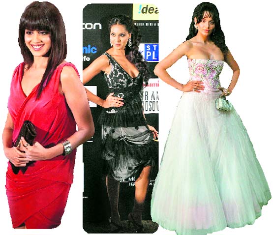 Genelia D'Souza looked stunning in a red dress at the IIFA Award ceremony. Bips was amongst the best dressed who opted for Western silhoutte. Kangana wore a pristine white wedding dress-like attire.