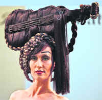A model presents a creation during a hair show in Budapest on Sunday.