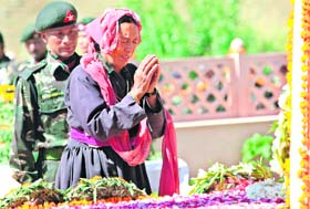 A SALUTE: Mother of a martyr gets emotional after laying a wreath at Drass War Memorial as the Army observed the 10th anniversary of Operation Vijay in Drass