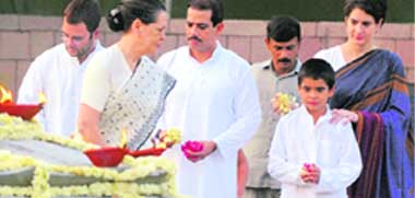 Congress chief Sonia Gandhi with Rahul, Priyanka, Robert Vadra and grandson Rehan pays tribute at Veer Bhumi on the 65th birth anniversary of former Prime Minister Rajiv Gandhi in New Delhi