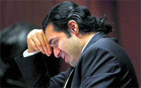 Anand Jon Alexander, 35, weeps in Los Angeles County Superior Court on Monday.