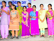 Students of Sri Guru Harkrishan Public School perform at the Teacher’s Day function in Dohara on Saturday.