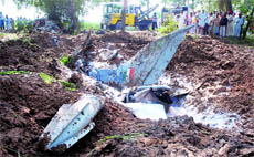 A crater formed in field after MIG-21 crashed at Bhaliana village in Muktsar district on Thursday.