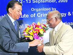 CBI director Ashwani Kumar (L) welcomes CJI KG Balakrishnan at a seminar on Fighting Crimes Related to Corruption in New Delhi on Saturday.