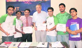 RIMT chairman Hukam Chand Bansal and principal Harsh Sadawarti honour the winner team at Mandi Gobindgarh