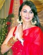 Actor Rani Mukherjee gestures during her visit to a pandal of Hindu Goddess Durga during the Durga Puja festival, a popular religious event for Hindu Bengalis, in Mumbai.