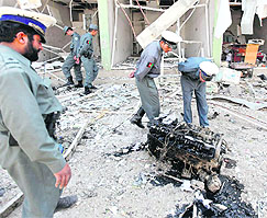 Afghan cops at the blast site outside the Indian embassy in Kabul. 