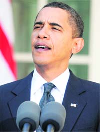 US President Barack Obama speaks, after winning the Nobel Peace Prize, at the Rose Garden of the White House in Washington
