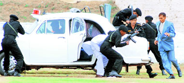 NSG commandos during a mock exercise at a function to celebrate its 25th Raising Day at Manesar, Gurgaon, on Friday.