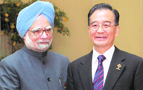 Prime Minister Manmohan Singh with Chinese Premier Wen Jiabao on the sidelines of the ASEAN-India Summit in Hua Hin, Thailand, on Saturday.