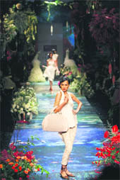 Models present creations from Tarun Tahiliani's Spring/Summer 2010 collection at the Wills Lifestyle India Fashion Week in New Delhi on Saturday.