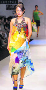 Actor Minissha Lamba walks the ramp during the 'Wills Lifestyle India Fashion Week' in New Delhi on Monday.