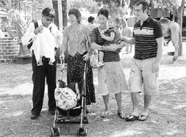 Tourists enjoy a day out at the National Crafts Mela at Kalagram.