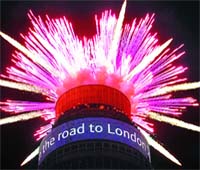 The BT Tower in London, lit up with the flashing up of a screen and fireworks, 1,000 days before the London 2012 Olympics