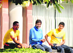 Cricketers ( L to R) Parveen Kumar and Munaf Patel enjoy the balmy afternoon at Taj-17 on Tuesday.