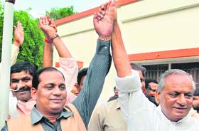 Former UP Chief Minister Kalyan Singh with his son Rajbir, after addressing a press conference, in Lucknow