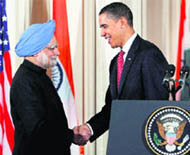 US President Barack Obama greets Prime Minister Manmohan Singh during the state ceremony at the White House in Washington on Tuesday.