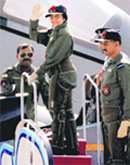 President Pratibha Patil waves as she prepares to fly in the Sukhoi-30 of the IAF at Lohegaon Air Force base in Pune