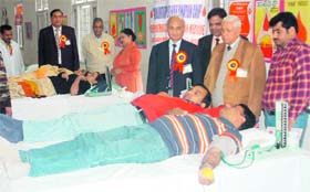 Volunteers donate blood at a camp organised by Maharaja Aggarsain Sewa Sangh in Ludhiana