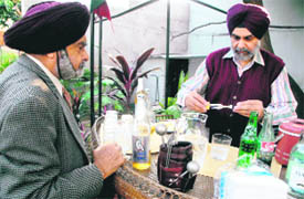 Major Jagjit Singh enjoys a drink.
