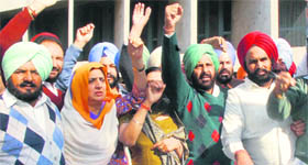 Angry Congress MLAs walk out of the Punjab Vidhan Sabha led by Leader of the Opposition Rajinder Kaur Bhattal in Chandigarh on Tuesday.