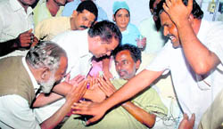 TRS supporters meet party president K. Chandrasekhar Rao after he called off the hunger strike in Hyderabad.