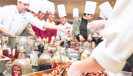 Cake-mixing ceremony at a hotel announces the start of Christmas celebrations in Ludhiana.