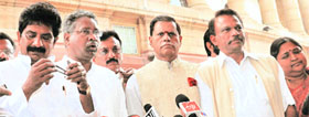 Anti-Telangana MPs from Andhra Pradesh talk to mediapersons after meeting Prime Minister Manmohan Singh at Parliament in New Delhi on Friday.