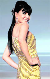 Actor Koena Mitra displays the creation of designer Pria Kataaria Puri at the Chennai International Fashion Week.