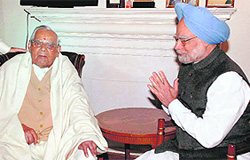 Prime Minister Manmohan Singh greets former Prime Minister and BJP veteran Atal Bihari Vajpayee on his 85th birthday at latters residence in New Delhi on Friday. Vajpayee has not been seen in public for over a year due to his illness.