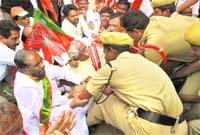 The police detains former Union Minister and BJP state president Bandaru Dattatreya demonstrating, along with party men, outside Raj Bhawan demanding withdrawal of cases against the pro-Telangana students in Hyderabad