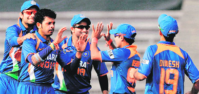 S Sreesanth celebrates the wicket of Sri Lankas Thilan Samaraweera during their match for the tri-nation ODI tournament at the Sher-e-Bangla National Stadium in Dhaka on Sunday. India won the match by eight wickets to book a berth in final.