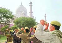 Jawans observe the eclipse near Taj Mahal in Agra