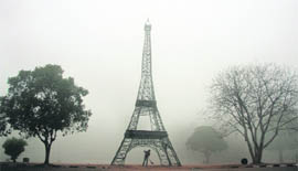 The fog, the trees and the replica of the Eiffel Tower create the magic of Paris in our own Leisure Valley.