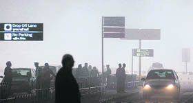 A view of the fog-engulfed domestic airport in New Delhi. Thick fog across North India disrupted over hundred flights on Thursday.