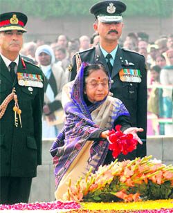 President Pratibha Patil pays homage to Mahatma Gandhi at Rajghat in New Delhi on Saturday.