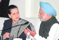 Prime Minister Manmohan Singh and AICC chief Sonia Gandhi during the CWC meeting in New Delhi on Friday.