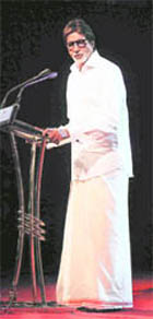 Bollywood actor Amitabh Bachchan dons a traditional attire from Kerela during a private function at Kochi