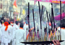 Incense sticks being burnt durign the rath yatra taken out ahead of Shivratri at Shivala Mandir in Ludhiana on Wednesday
