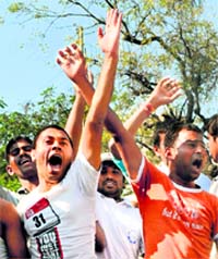 Members of the Telangana Students Joint Action Committee shout slogans against the Srikrishna Commission during their protest at Osmania University in Hyderabad on Friday.