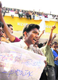 Students of Nizam College raise slogans during a demonstration for separate Telangana state in Hyderabad on Saturday.