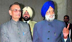 Punjab Governor Shivraj V Patil and Vidhan Sabha Speaker Nirmal Singh Kahlon on their way to attend a session of the Assembly in Chandigarh on Thursday.