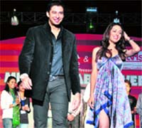 Zulfi Syed walks with a model at Panjab University for Jhankaar-2010