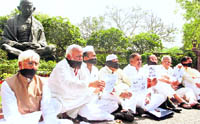 Suspended Rajya Sabha MPs protest at Parliament House