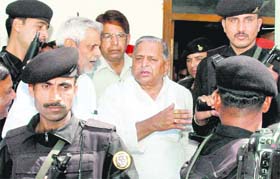 SP president Mulayam Singh Yadav arrives to address a press meet in Lucknow