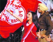 Preity Zinta in a cheerful mood during the first IPL III match in Mohali on Saturday.