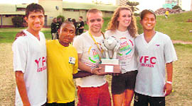 YFC Rurka Kalan captain Amritpal (extreme right) and Manpreet Kumar (extreme left) with other players in Durban.