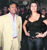 IPL commissioner Lalit Modi along with Bollywood actor Susmita Sen watching an Indian Premier League-3 match live at a theatre in Thane, Mumbai on Sunday.
