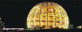 The globe of the European Organisation for Nuclear Research stands illuminated outside Geneva on Tuesday.