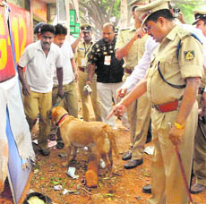 Policemen at the blast site in Bangalore on Saturday.